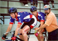 Coach Mark Tyson holding the bike for Garth and Matt at the 1998 IPC World Cycling Championships in Colorado Springs, Colorado. (Photo by Casey Gibson)